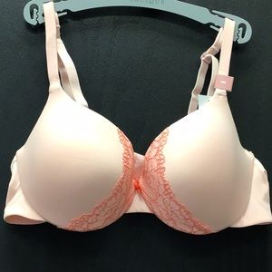 Peach colored bra with lace